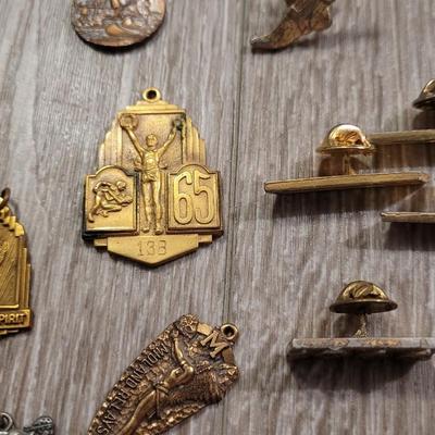 Collection of Vintage US High School & Collegiate Patches, Medals, & Pins for Sports and Academic Achievements