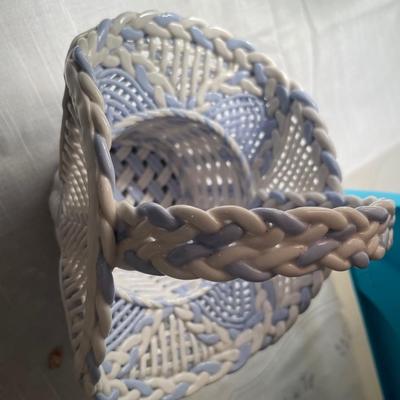 Small tote with glass bottles and blue ceramic basket