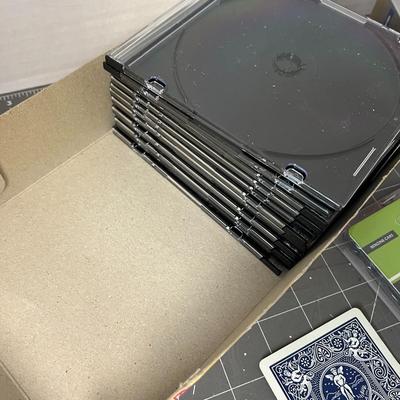 Eco OBD2 Vehicle Chip Box, CD Cases, and Floppy Disks