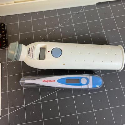 Medicine Cabinet, Thermometers, and Comb