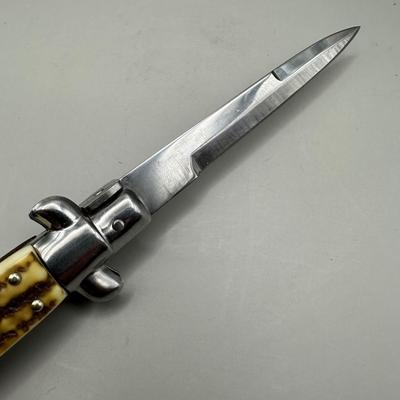 9â€ Stiletto Swing Blade Knife
