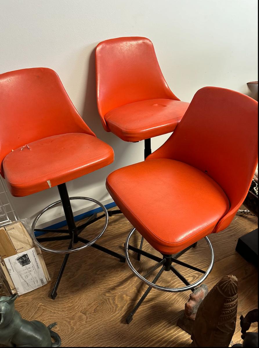 Three Mid Century Modern Orange Leather Bar Stools