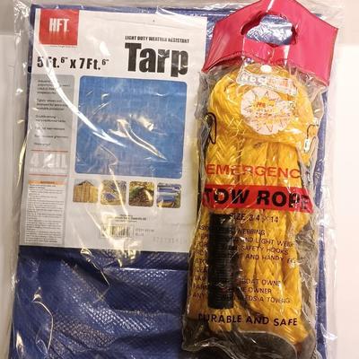 Brand new 5' x 7' Tarp with a new 3/4 x 14' Emergency Tow rope