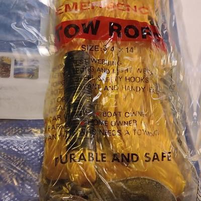 Brand new 5' x 7' Tarp with a new 3/4 x 14' Emergency Tow rope