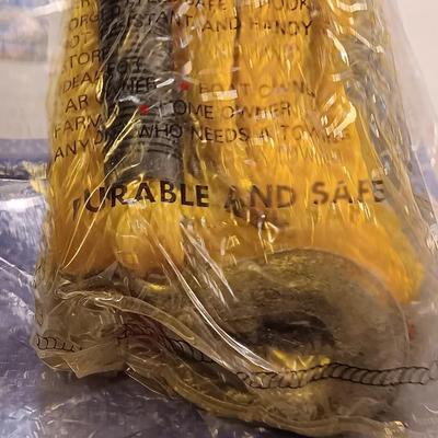 Brand new 5' x 7' Tarp with a new 3/4 x 14' Emergency Tow rope