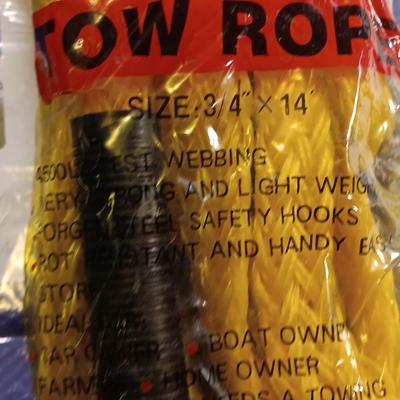 Brand new 5' x 7' Tarp with a new 3/4 x 14' Emergency Tow rope