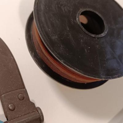 Pro series 25-foot tape measure - Hack saw - Emery cloth roll - and a Stanley adjustable bevel Angle