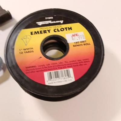 Pro series 25-foot tape measure - Hack saw - Emery cloth roll - and a Stanley adjustable bevel Angle