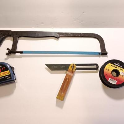 Pro series 25-foot tape measure - Hack saw - Emery cloth roll - and a Stanley adjustable bevel Angle