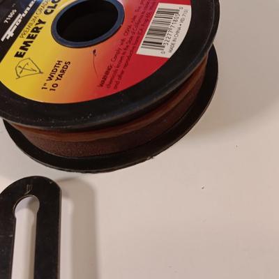 Pro series 25-foot tape measure - Hack saw - Emery cloth roll - and a Stanley adjustable bevel Angle