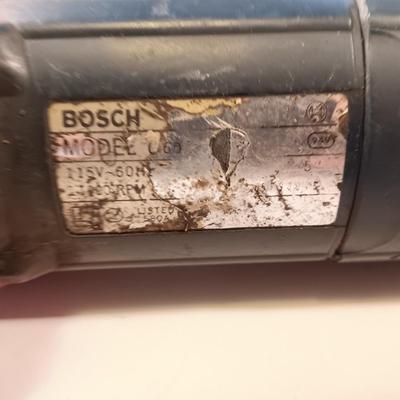 Bosch Angle grinder with Vortec 4" knot wire brush head
