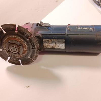 Bosch Angle grinder with Vortec 4" knot wire brush head