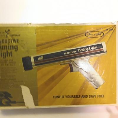 Craftsman inductive timing light with Funnels ice scraper and windshield wash tool
