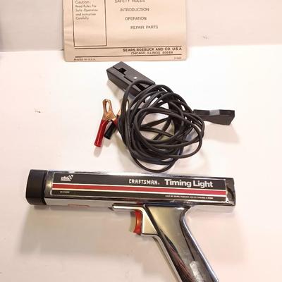 Craftsman inductive timing light with Funnels ice scraper and windshield wash tool