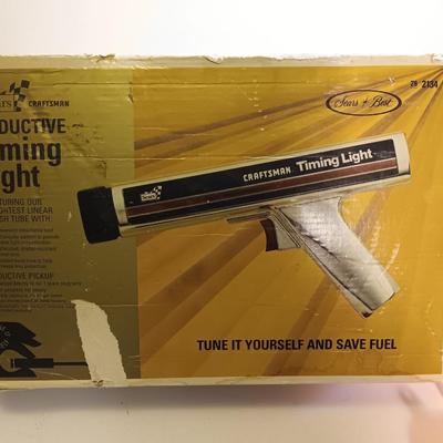 Craftsman inductive timing light with Funnels ice scraper and windshield wash tool