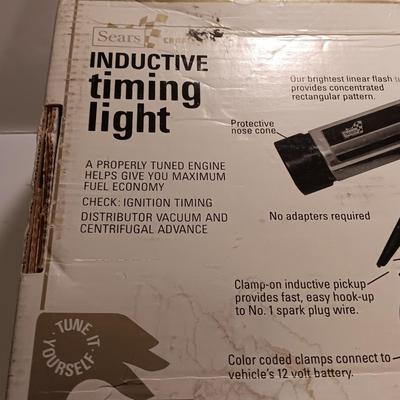 Craftsman inductive timing light with Funnels ice scraper and windshield wash tool