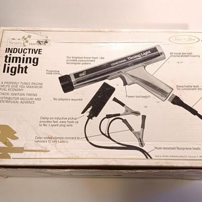 Craftsman inductive timing light with Funnels ice scraper and windshield wash tool