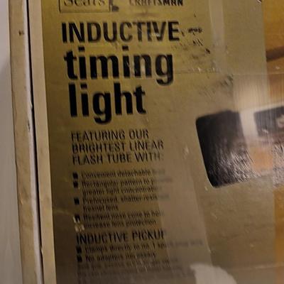 Craftsman inductive timing light with Funnels ice scraper and windshield wash tool