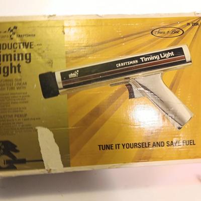 Craftsman inductive timing light with Funnels ice scraper and windshield wash tool