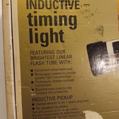Craftsman inductive timing light with Funnels ice scraper and windshield wash tool