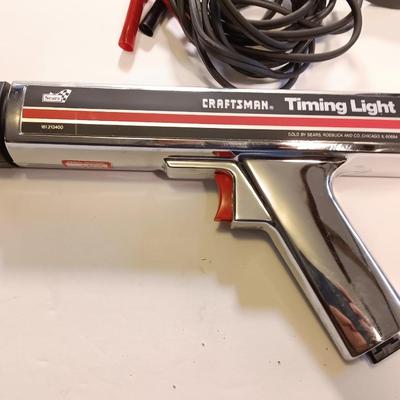 Craftsman inductive timing light with Funnels ice scraper and windshield wash tool