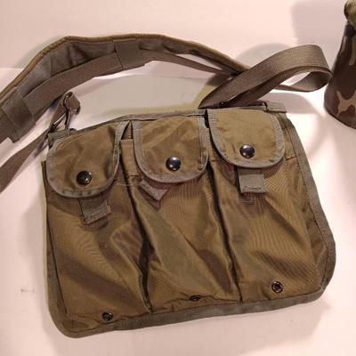 Army Bandoleer with camouflage covered canteen.