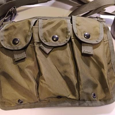 Army Bandoleer with camouflage covered canteen.