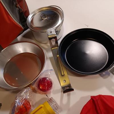 Orange backpack / bug out bag with contents - cookware - and survival goods