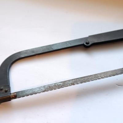Hacksaw - 25"-foot tape measure - and a new file