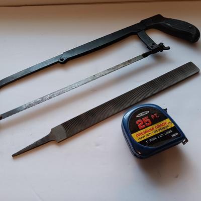 Hacksaw - 25"-foot tape measure - and a new file