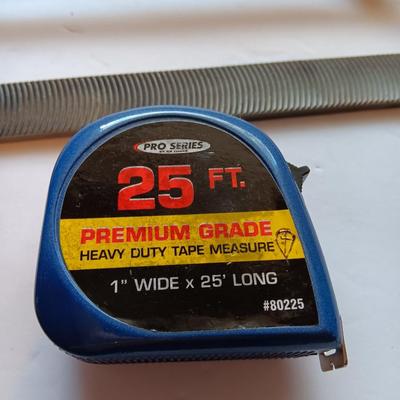 Hacksaw - 25"-foot tape measure - and a new file