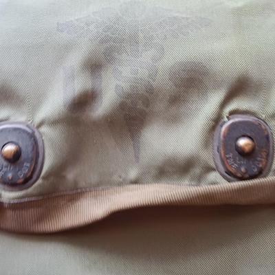 Assortment of military issued bags / pouches and a belt.