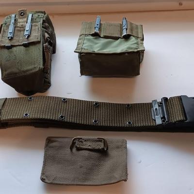 Assortment of military issued bags / pouches and a belt.