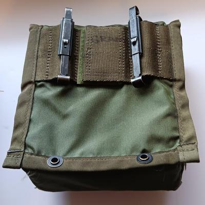 Assortment of military issued bags / pouches and a belt.