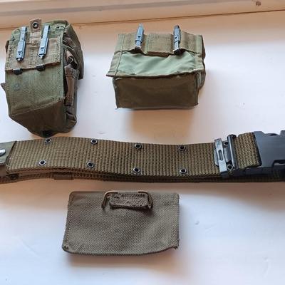 Assortment of military issued bags / pouches and a belt.