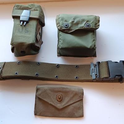 Assortment of military issued bags / pouches and a belt.