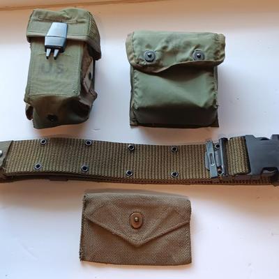 Assortment of military issued bags / pouches and a belt.