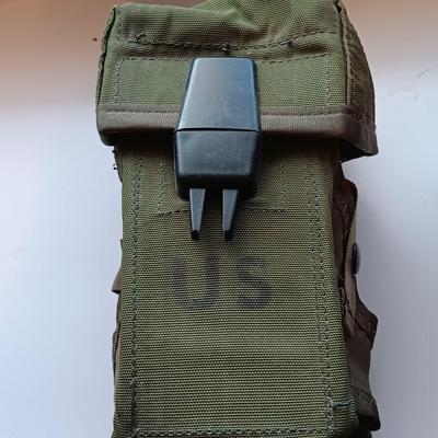 Assortment of military issued bags / pouches and a belt.