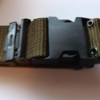 Assortment of military issued bags / pouches and a belt.