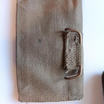 Assortment of military issued bags / pouches and a belt.