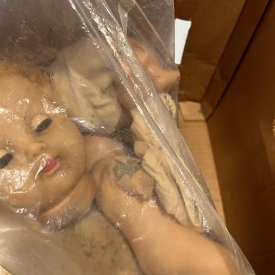 Box of dolls