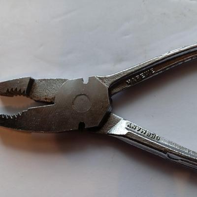 25' tape measure with pliers- crescent wrench and adjustable wrench