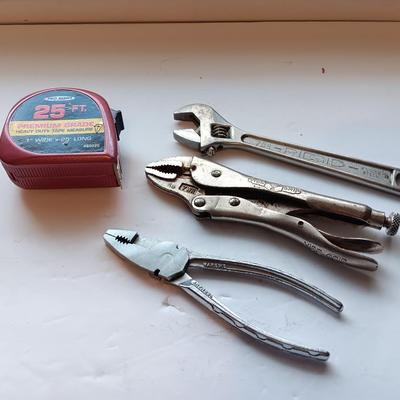 25' tape measure with pliers- crescent wrench and adjustable wrench