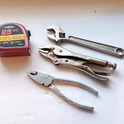 25' tape measure with pliers- crescent wrench and adjustable wrench