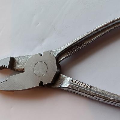 25' tape measure with pliers- crescent wrench and adjustable wrench