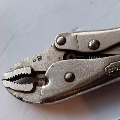 25' tape measure with pliers- crescent wrench and adjustable wrench