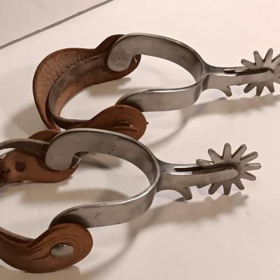 Vintage western Crockett Spurs with leather boot strap engraved with John on the side