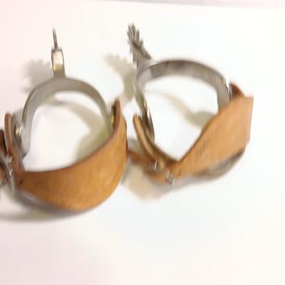 Vintage western Crockett Spurs with leather boot strap engraved with John on the side