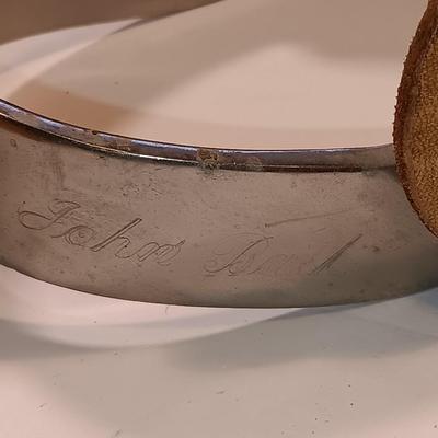 Vintage western Crockett Spurs with leather boot strap engraved with John on the side