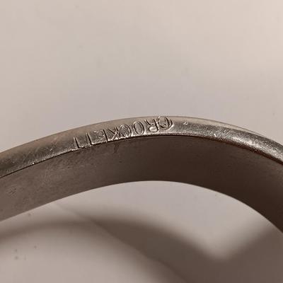Vintage western Crockett Spurs with leather boot strap engraved with John on the side